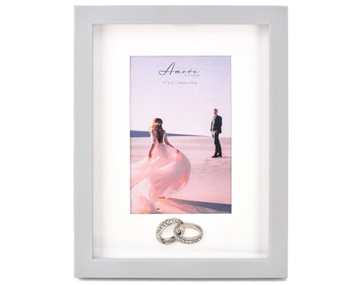4x6in PLASTIC PHOTO FRAME WITH RINGS ICON